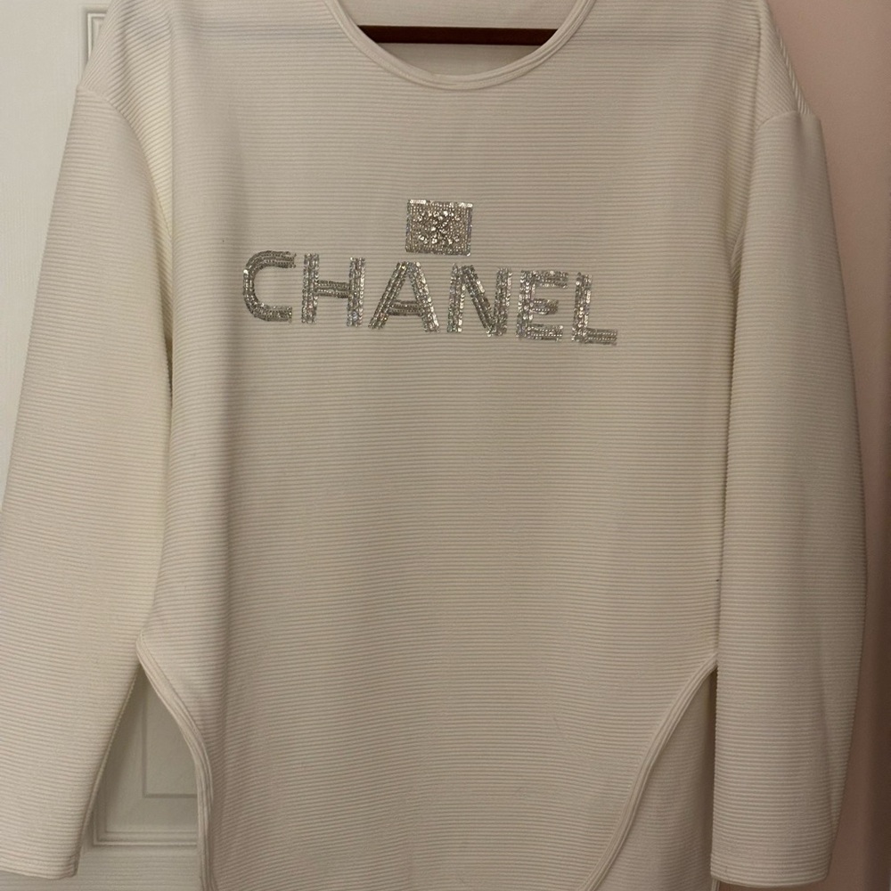 CHANEL Ivory Top with Metallic Logo